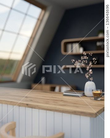A glass of coffee and book with flower vase on wooden counter table aside roof window in attic room. 136648696