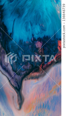 Defocused spreading paint. Color blob blot. Blue black fluid explosion on orange acrylic background. Art blend abstract dirty texture. 136648739