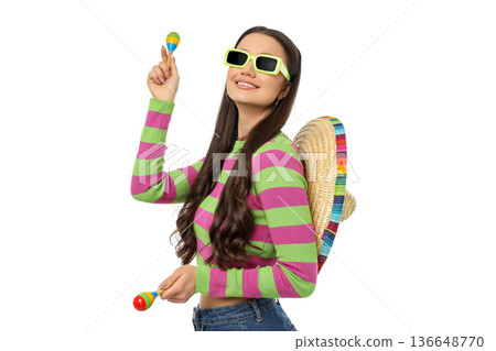 Woman wearing vibrant clothing celebrating with maracas, isolated, PNG Woman wearing vibrant clothing celebrating with maracas, isolated, PNG 136648770