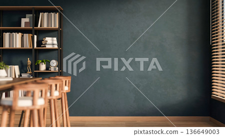 Wooden stool chair and table with bookshelf aside dark green wall and window in living room library. Wooden stool chair and table with bookshelf aside dark green wall and window in living room library. 136649003