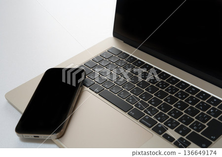 Laptops and smartphones 136649174