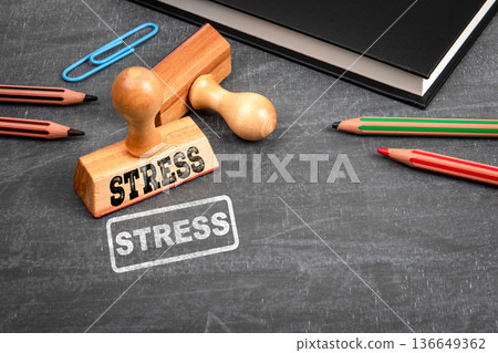 Stress Concept With Stamp And Office Supplies On Chalkboard Background Stress Concept With Stamp And Office Supplies On Chalkboard Background 136649362