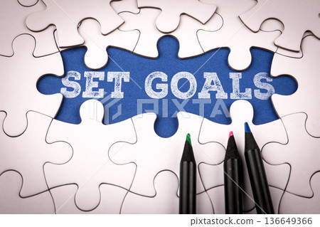 SET GOALS Planning Concept With Puzzle Pieces And Color Pencils 136649366