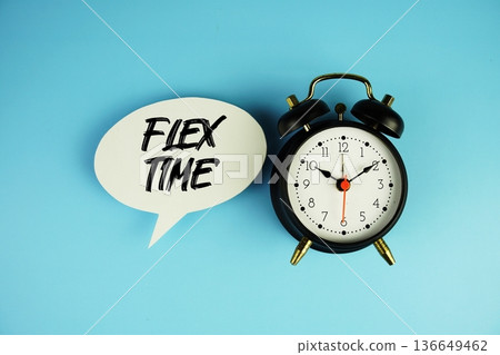 Flextime text on speech bubble with alarm clock on blue background 136649462