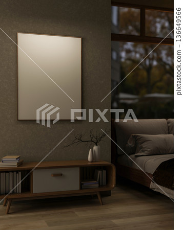 White frame on wall over bookshelf drawer table on wooden parquet floor in a dim bedroom with window 136649566