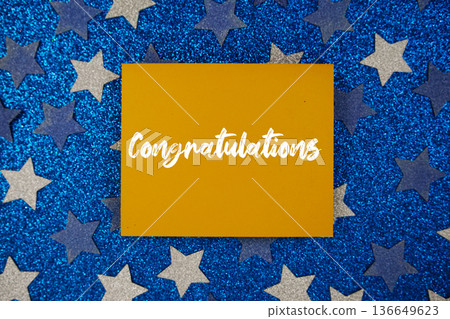 Congratulations Card on Blue Glitter Star Background Congratulations Card on Blue Glitter Star Background 136649623
