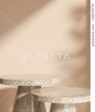 Round granite stone table display platform with sunlight shadow on plain concrete wall background. Round granite stone table display platform with sunlight shadow on plain concrete wall background. 136649754