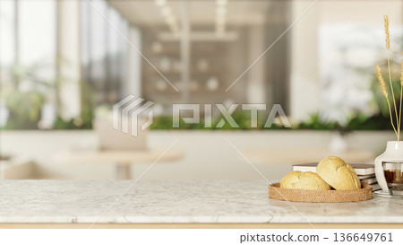 Bread on plate and coffee cup with books on marble counter across stool table and glass wall in cafe Bread on plate and coffee cup with books on marble counter across stool table and glass wall in cafe 136649761
