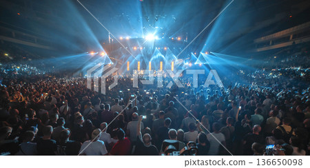 people having fun at a rock band concert 136650098