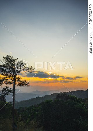 landscape and travel concept with sunset and twilight sky with layer of mountain landscape and travel concept with sunset and twilight sky with layer of mountain 136650289