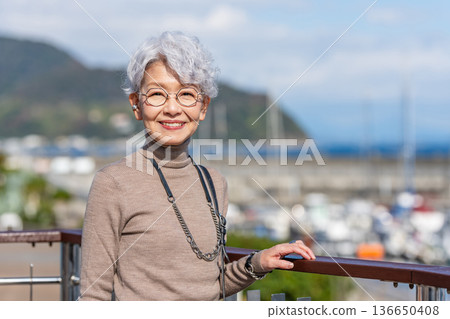 Senior woman traveling Senior woman traveling 136650408