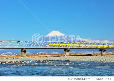 Mt. Fuji and Doctor Yellow in the blue sky Mt. Fuji and Doctor Yellow in the blue sky 136650434