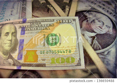 Vintage Style Stack of US Hundred Dollar Bills. A textured, old-photo effect overlaying a pile of $100 American banknotes, highlighting financial concepts and wealth. Vintage Style Stack of US Hundred Dollar Bills. A textured, old-photo effect overlaying a pile of $100 American banknotes, highlighting financial concepts and wealth. 136650488