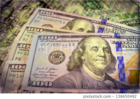 Vintage Style Stack of US Hundred Dollar Bills. A textured, old-photo effect overlaying a pile of $100 American banknotes, highlighting financial concepts and wealth. Vintage Style Stack of US Hundred Dollar Bills. A textured, old-photo effect overlaying a pile of $100 American banknotes, highlighting financial concepts and wealth. 136650492