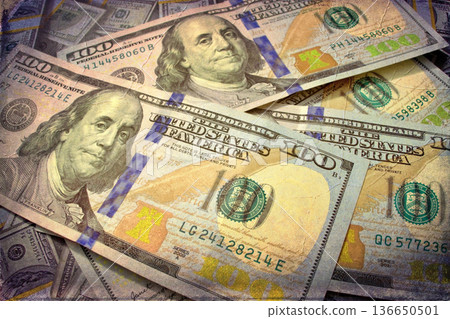 Vintage Style Stack of US Hundred Dollar Bills. A textured, old-photo effect overlaying a pile of $100 American banknotes, highlighting financial concepts and wealth. Vintage Style Stack of US Hundred Dollar Bills. A textured, old-photo effect overlaying a pile of $100 American banknotes, highlighting financial concepts and wealth. 136650501