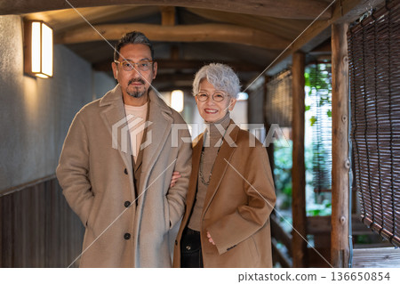 Senior couple enjoying a trip. Photo courtesy of Ito Ryokuyo. 136650854