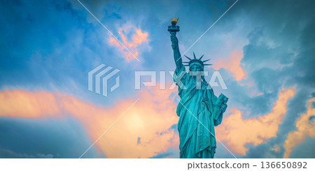Statue of Liberty in the background of skyscrapers in Manhattan 136650892