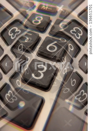 Abstract Financial Numbers Background.A distorted, view of calculator keys. A powerful visual concept for finance, economy, data, and complex mathematical calculations. Abstract Financial Numbers Background.A distorted, view of calculator keys. A powerful visual concept for finance, economy, data, and complex mathematical calculations. 136651701