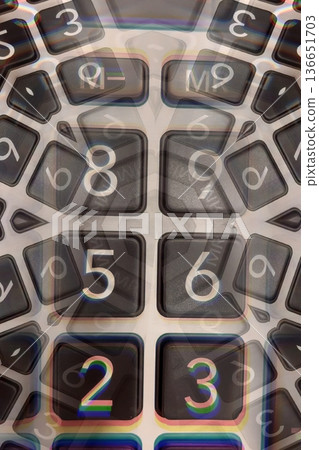 Abstract Financial Numbers Background.A distorted, view of calculator keys. A powerful visual concept for finance, economy, data, and complex mathematical calculations. Abstract Financial Numbers Background.A distorted, view of calculator keys. A powerful visual concept for finance, economy, data, and complex mathematical calculations. 136651703