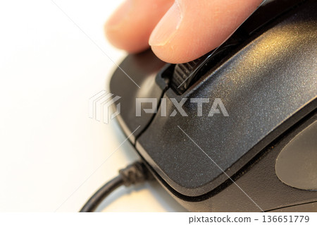 Spin the mouse wheel with your finger Spin the mouse wheel with your finger 136651779