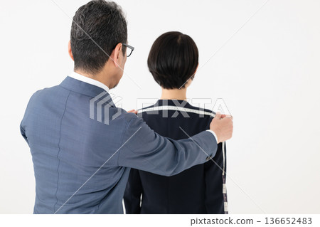 Man measuring suit size Man measuring suit size 136652483
