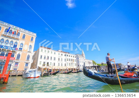 In a gondola in Venice 136653654