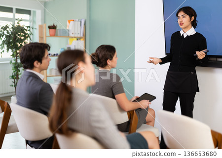 Malaysian woman speaking to an audience 136653680