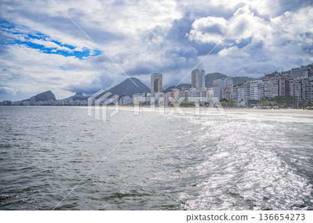 Palm trees and Copacabana beach. Rio Palm trees and Copacabana beach. Rio 136654273