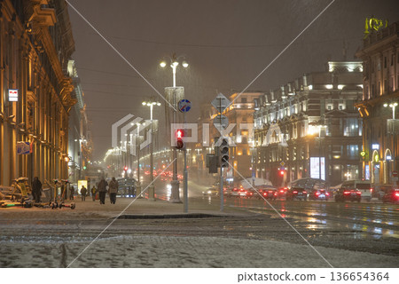 snowfall in the center of Minsk at night 136654364