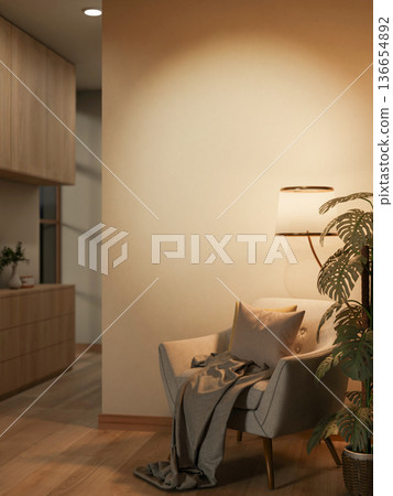 Sofa chair with cushion and blanket under lamp light and pot plant on wooden floor in dim corridor. Sofa chair with cushion and blanket under lamp light and pot plant on wooden floor in dim corridor. 136654892