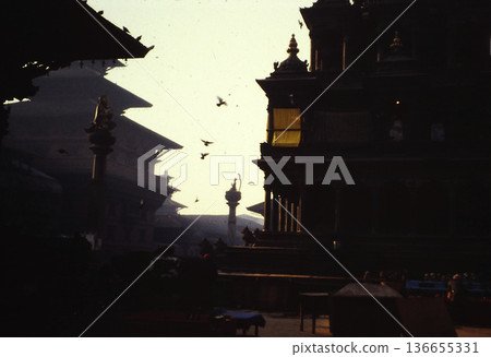 The silhouette of a traditional Nepalese temple at dusk (photographed in 1989) The silhouette of a traditional Nepalese temple at dusk (photographed in 1989) 136655331