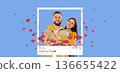 A collage captures a couple smiling and embracing on Valentine's Day. The background features a light blue color, and heart graphics float around the couple. The frame suggests a social media post. A collage captures a couple smiling and embracing on Valentine's Day. The background features a light blue color, and heart graphics float around the couple. The frame suggests a social media post. 136655422