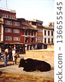 A street corner in Nepal with a sitting cow (photographed in 1989) 136655545
