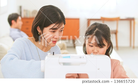Family conversation sewing machine image 136655720