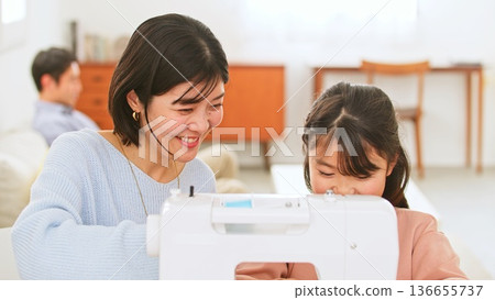 Family conversation sewing machine image Family conversation sewing machine image 136655737