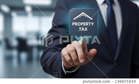 Businessman Interacting with Property Tax Digital Interface Icon 136655839