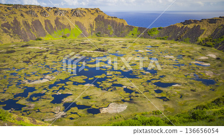 Caldera of Rano Kau volcano on Easter Island. Caldera of Rano Kau volcano on Easter Island. 136656054