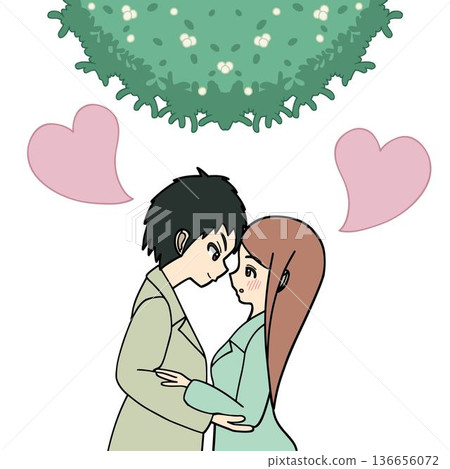 A couple gazing at each other under the mistletoe 136656072