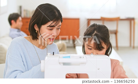 Family conversation sewing machine image Family conversation sewing machine image 136656250