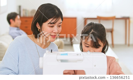 Family conversation sewing machine image 136656251