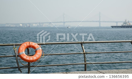 Yokohama Bay Bridge seen from the coast 136656395
