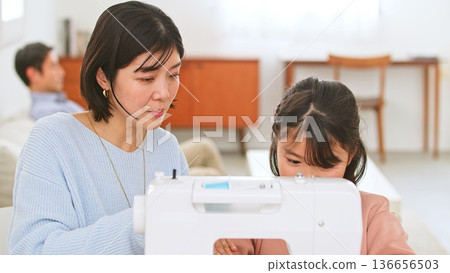 Family conversation sewing machine image Family conversation sewing machine image 136656503