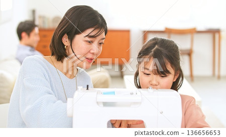 Family conversation sewing machine image Family conversation sewing machine image 136656653