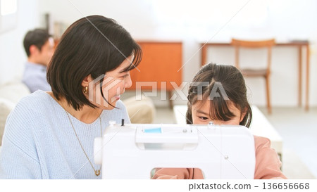 Family conversation sewing machine image Family conversation sewing machine image 136656668