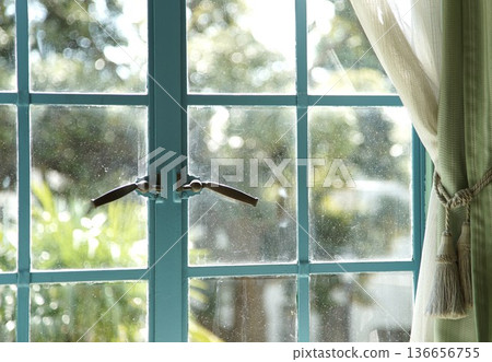 A window in a room on a sunny day A window in a room on a sunny day 136656755