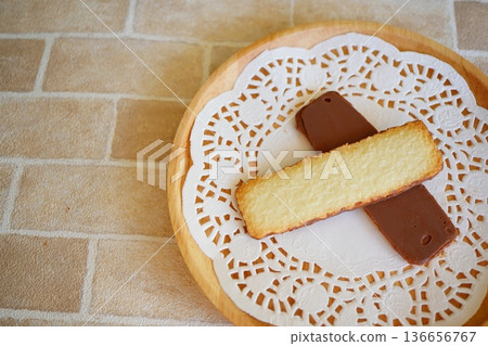 Baked goods and chocolate Western confectionery on lace paper Baked goods and chocolate Western confectionery on lace paper 136656767