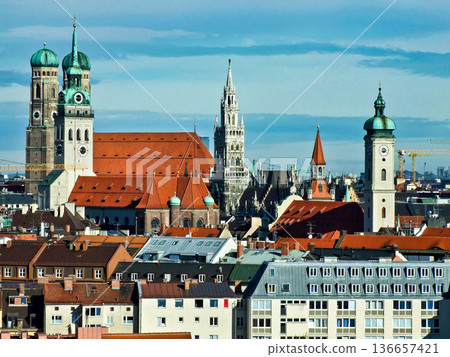 View over the city of Munich in Bavaria, Germany. The Cathedral of our dear Lady, Frauenkirche near centre at Marienplatz View over the city of Munich in Bavaria, Germany. The Cathedral of our dear Lady, Frauenkirche near centre at Marienplatz 136657421