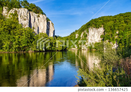 Danube river breakthrough near Kelheim, Bavaria, Germany with limestone rock formations and clear water Danube river breakthrough near Kelheim, Bavaria, Germany with limestone rock formations and clear water 136657425
