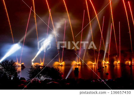 The colorful light of fireworks at Munich Olympiapark, Germany 136657430