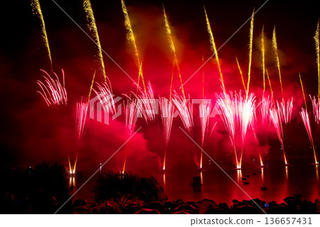 The colorful light of fireworks at Munich Olympiapark, Germany 136657431